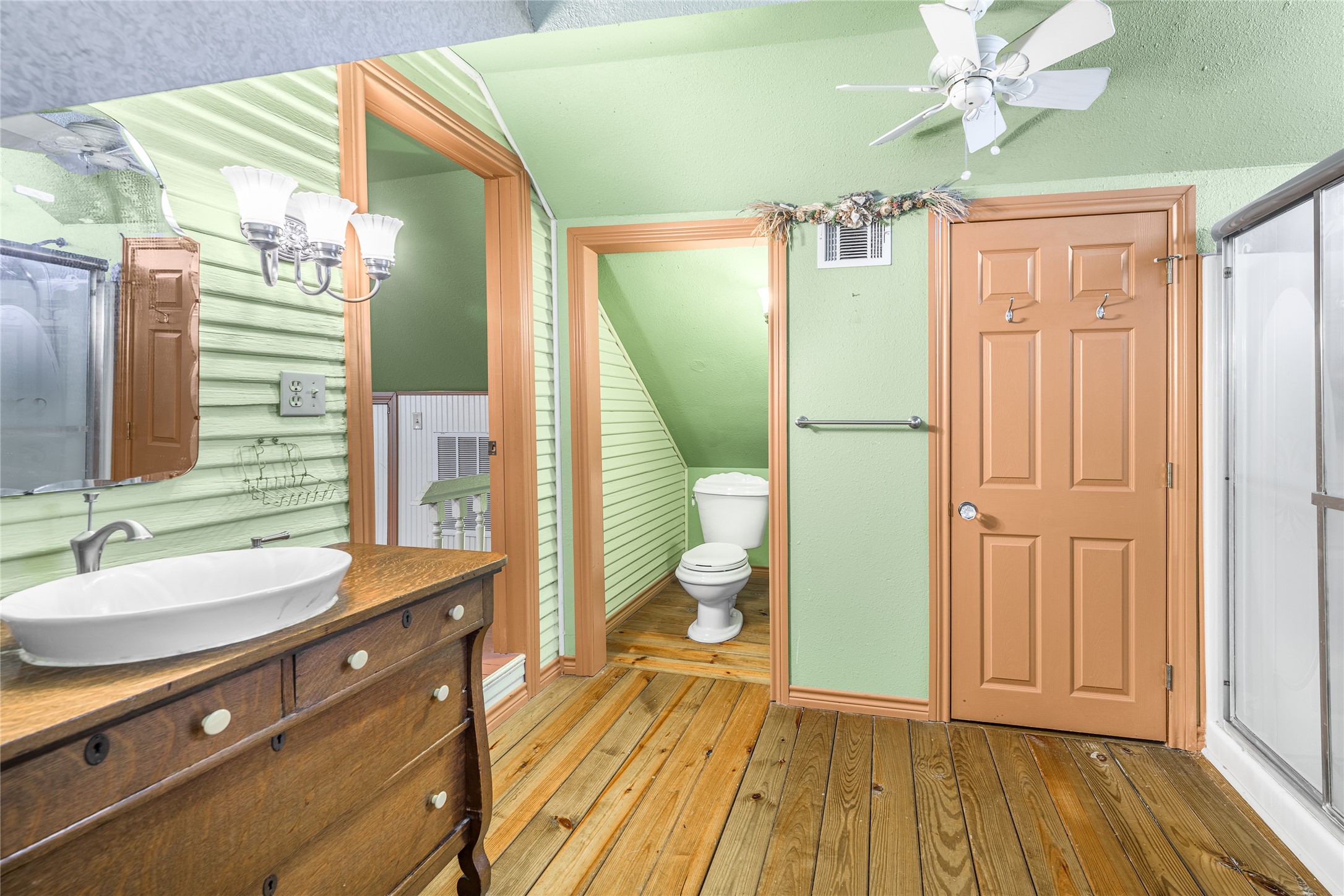 2020 South Knezek Road Flatonia, TX 78941 - Photo 13 of 25 a bathroom with a sink a mirror and a shower