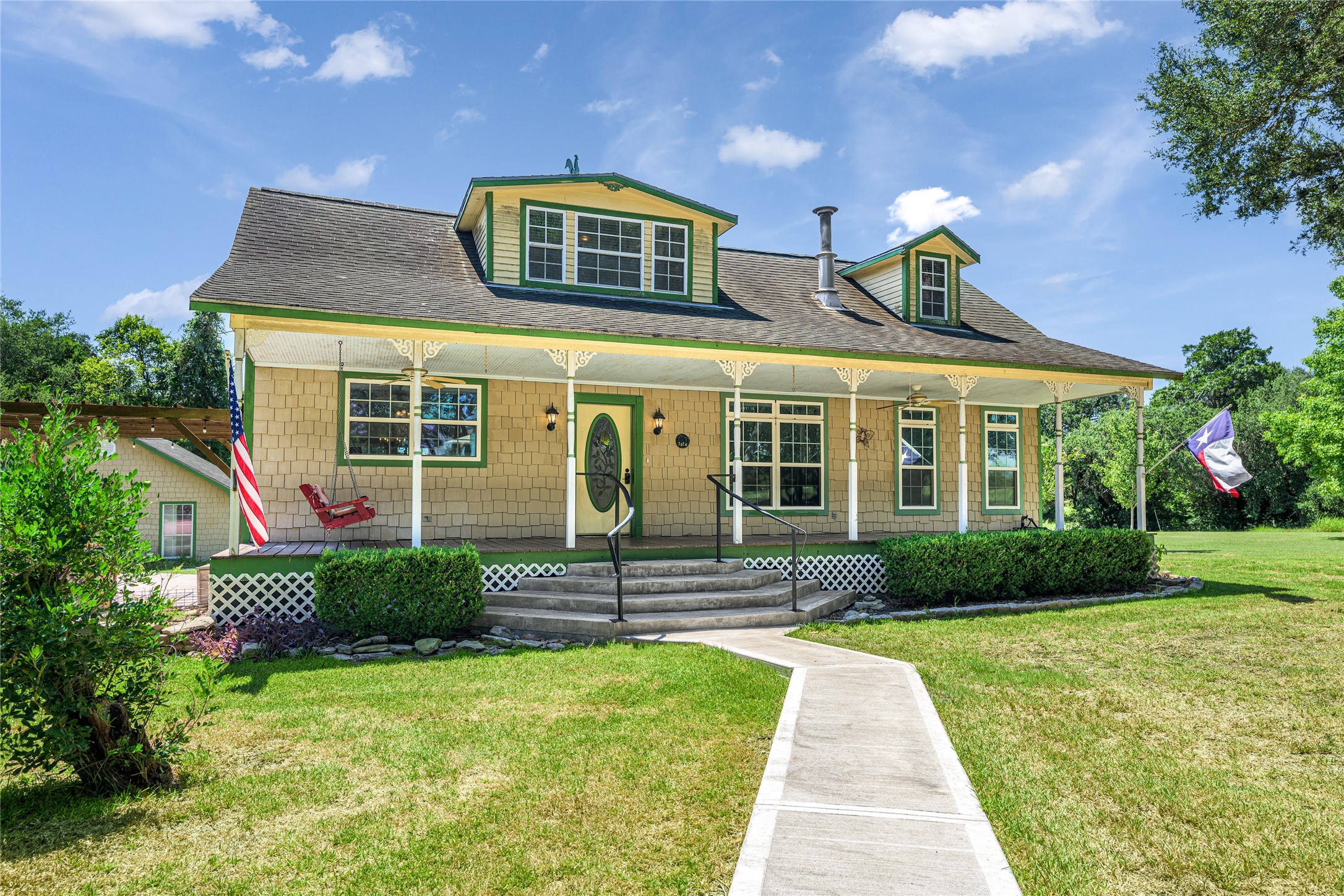 2020 South Knezek Road Flatonia, TX 78941 - Photo 2 of 25 a front view of a house with a yard