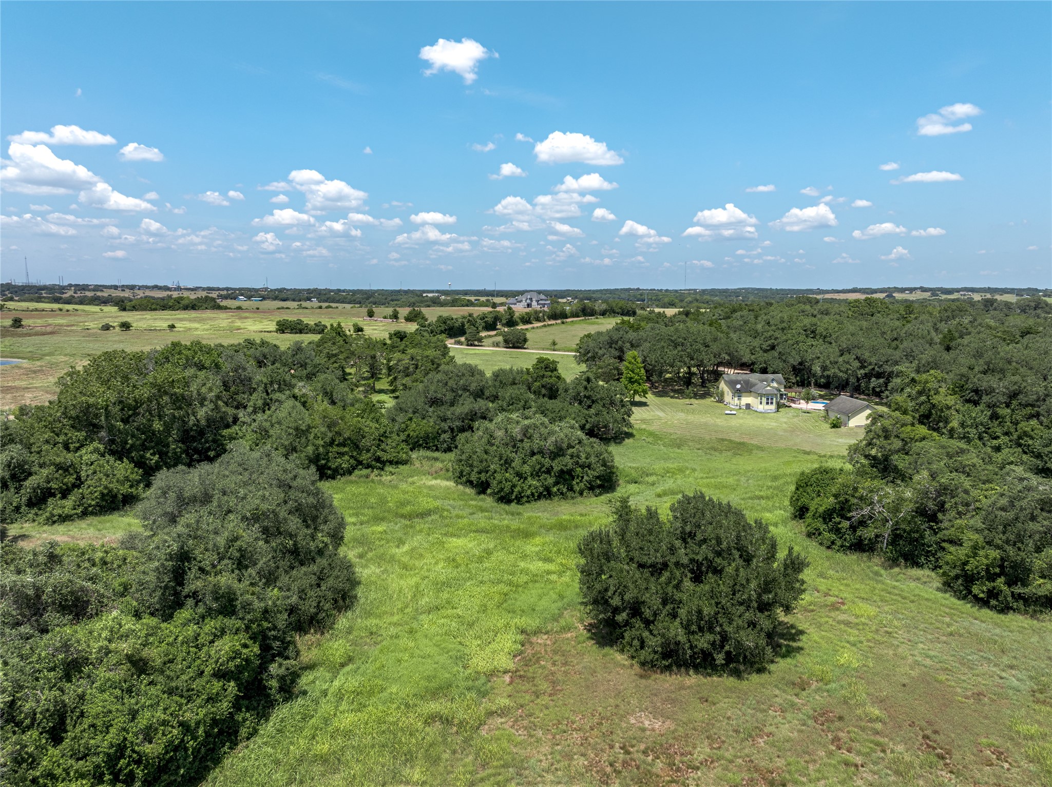 2020 South Knezek Road Flatonia, TX 78941 - Photo 24 of 25 a view of a lake in middle of forest