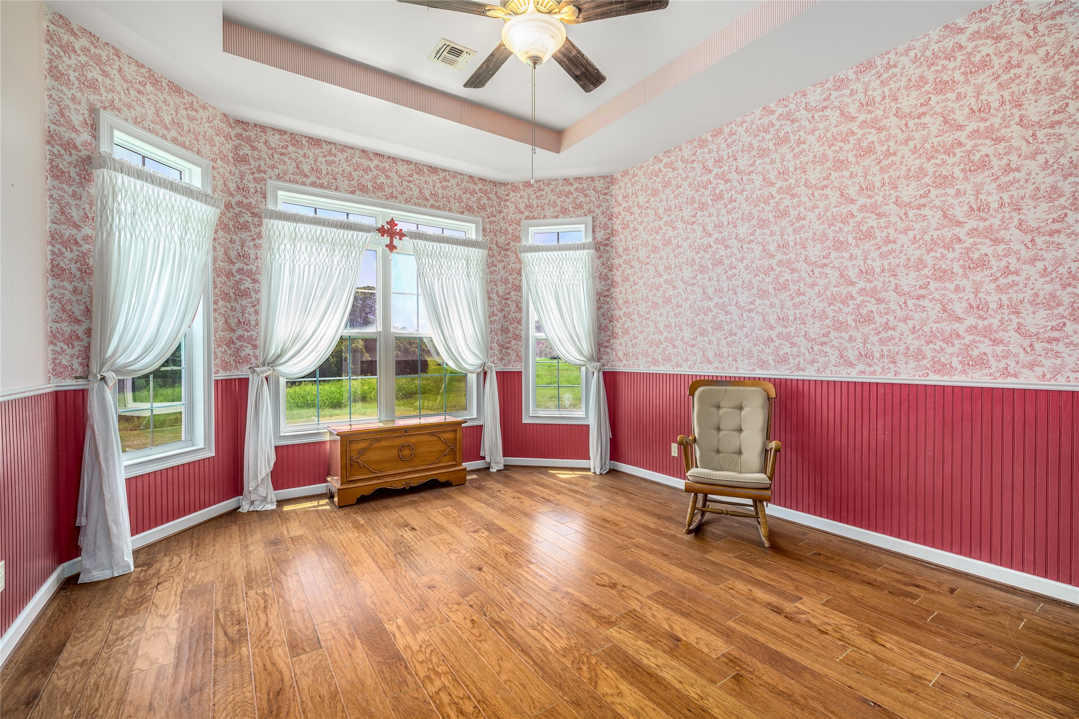 2020 South Knezek Road Flatonia, TX 78941 - Photo 10 of 25 a bedroom with furniture and a large window