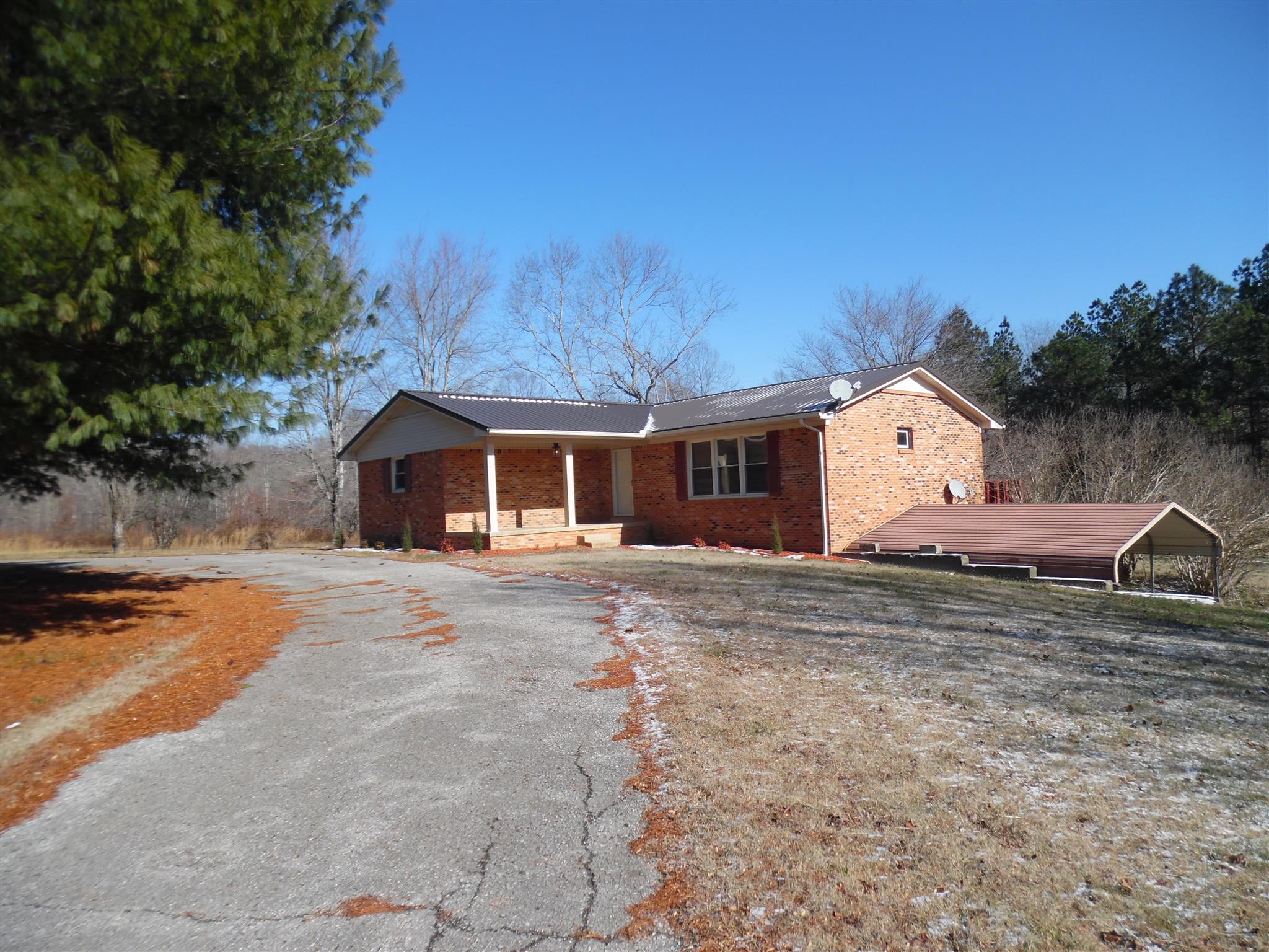 0 Frank Road Leoma, TN 38468 - Photo 1 of 18 a front view of a house with a yard