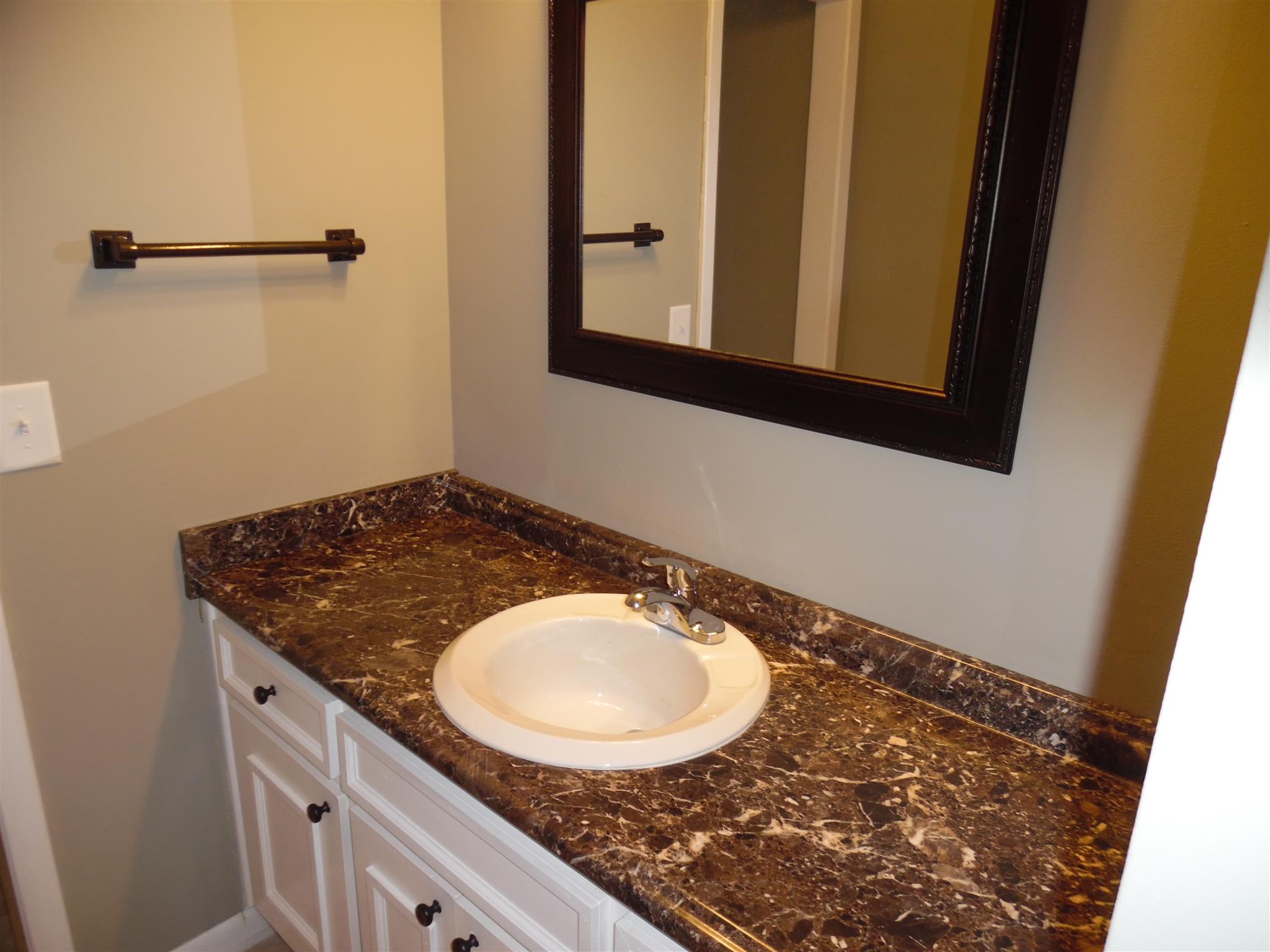 0 Frank Road Leoma, TN 38468 - Photo 11 of 18 a bathroom with a sink and a mirror