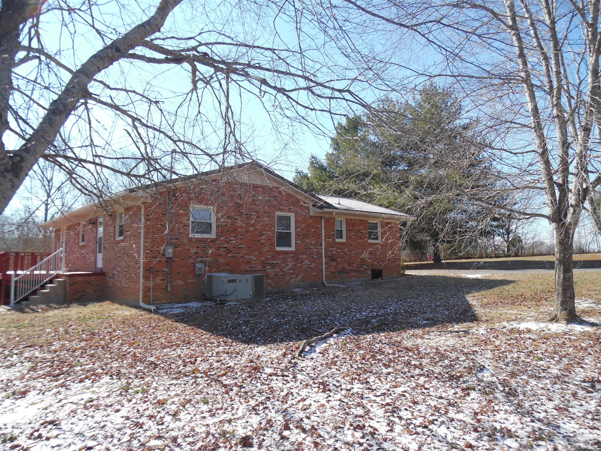 0 Frank Road Leoma, TN 38468 - Photo 4 of 18 a front view of a house with a yard