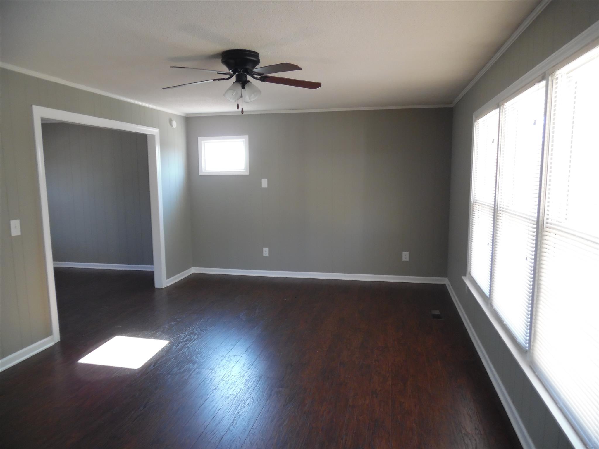 0 Frank Road Leoma, TN 38468 - Photo 5 of 18 an empty room with wooden floor and windows