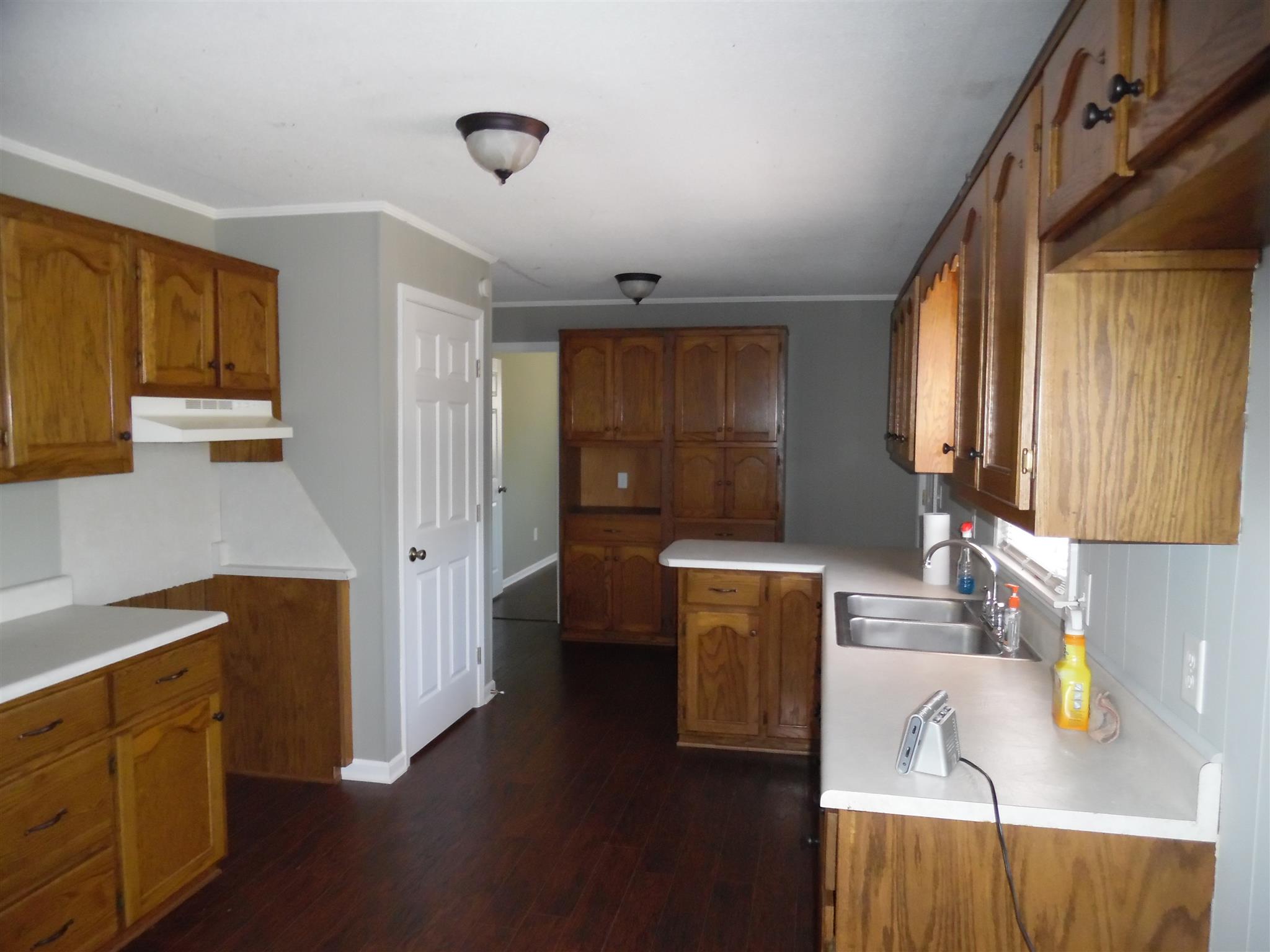 0 Frank Road Leoma, TN 38468 - Photo 6 of 18 a kitchen with a refrigerator and a stove top oven