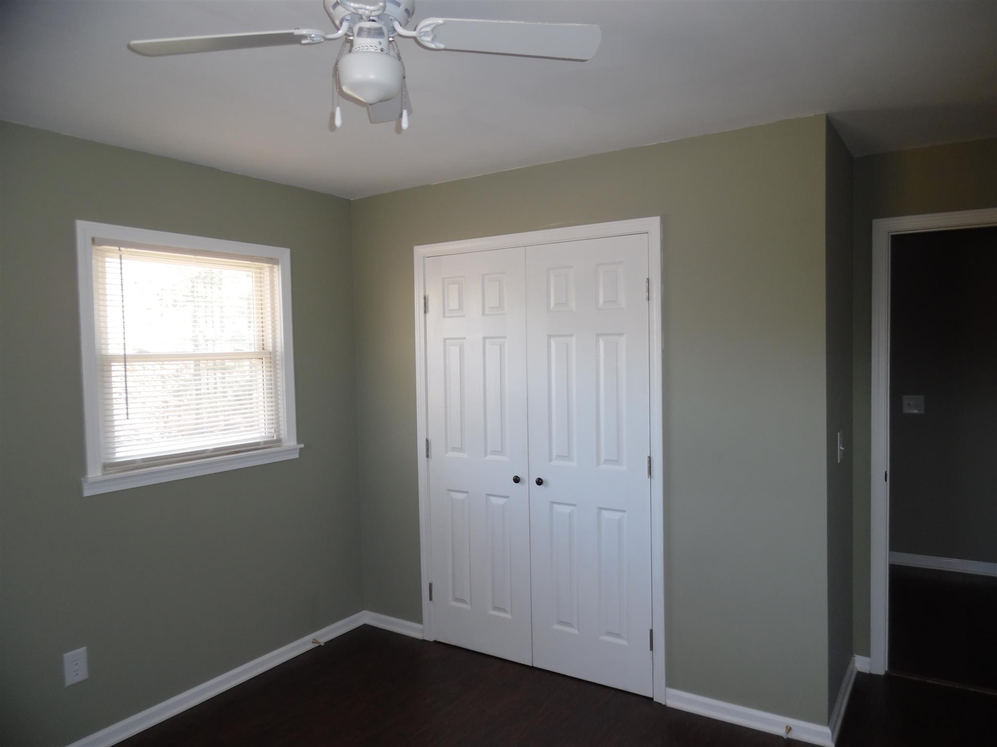0 Frank Road Leoma, TN 38468 - Photo 8 of 18 an empty room with windows and fan