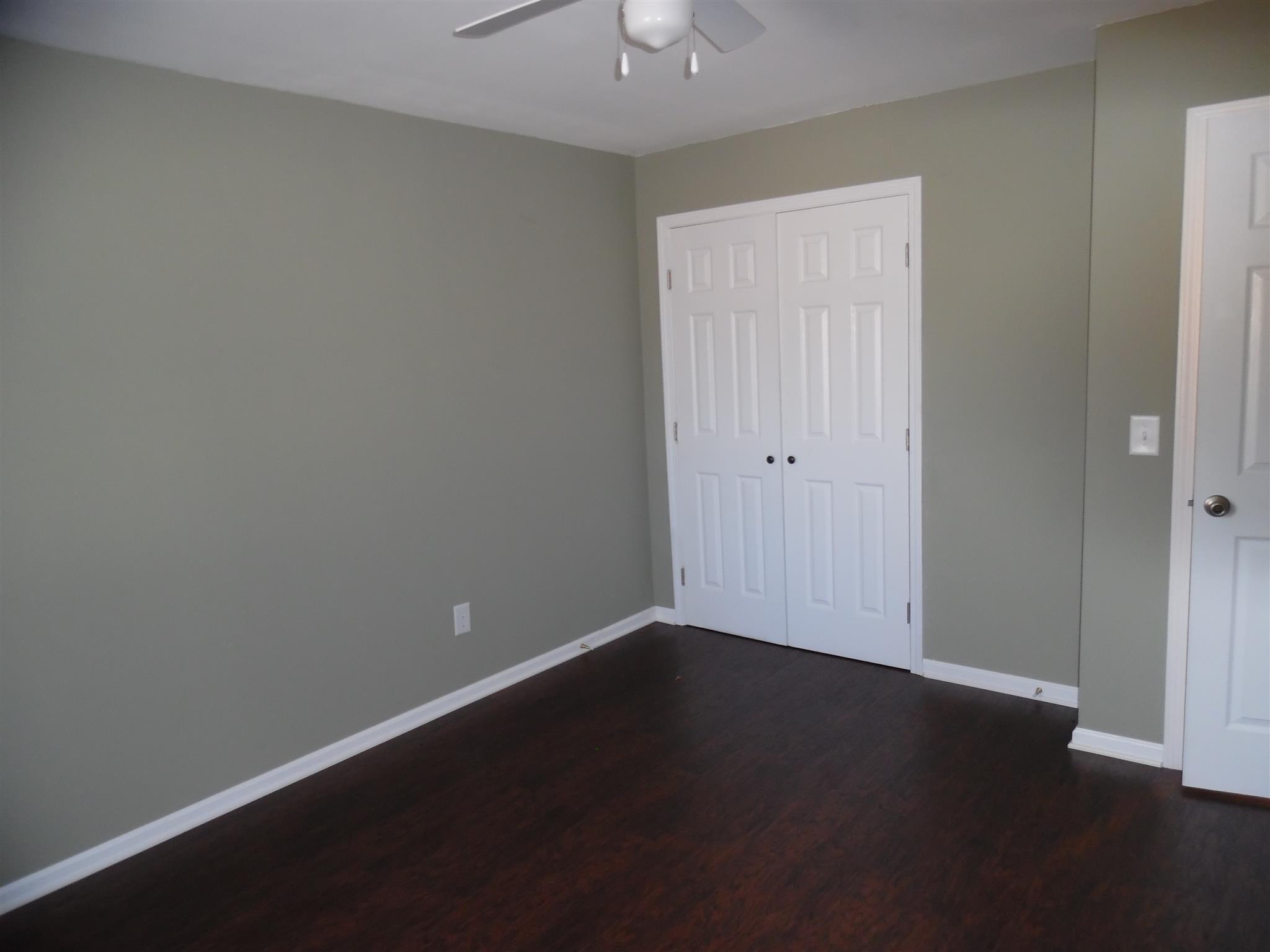 0 Frank Road Leoma, TN 38468 - Photo 10 of 18 a view of an empty room with wooden floor and a window