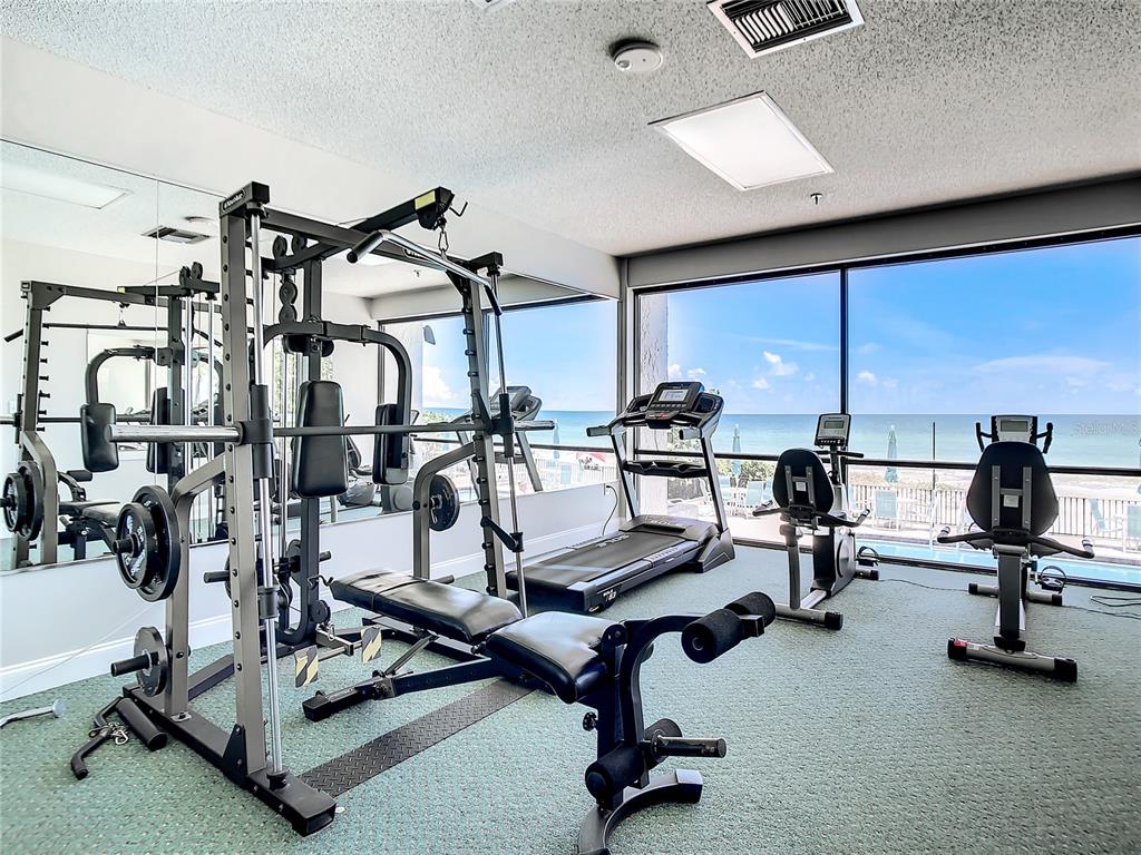 15462 Gulf Boulevard, Unit 501 Madeira Beach, FL 33708 - Photo 34 of 88 a view of a room with gym equipment