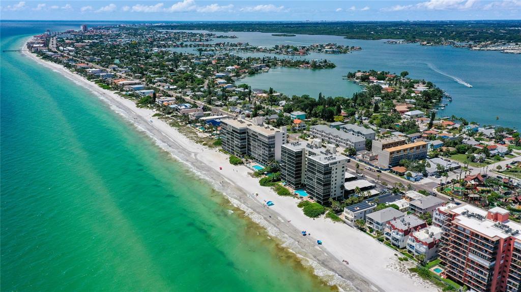 15462 Gulf Boulevard, Unit 501 Madeira Beach, FL 33708 - Photo 43 of 88 an aerial view of a residential houses with outdoor space and river