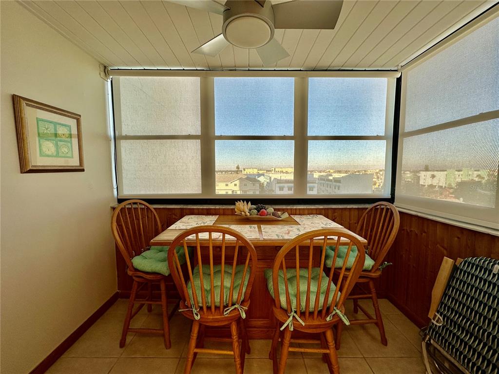 15462 Gulf Boulevard, Unit 501 Madeira Beach, FL 33708 - Photo 54 of 88 a view of a dining room with furniture window and outside view
