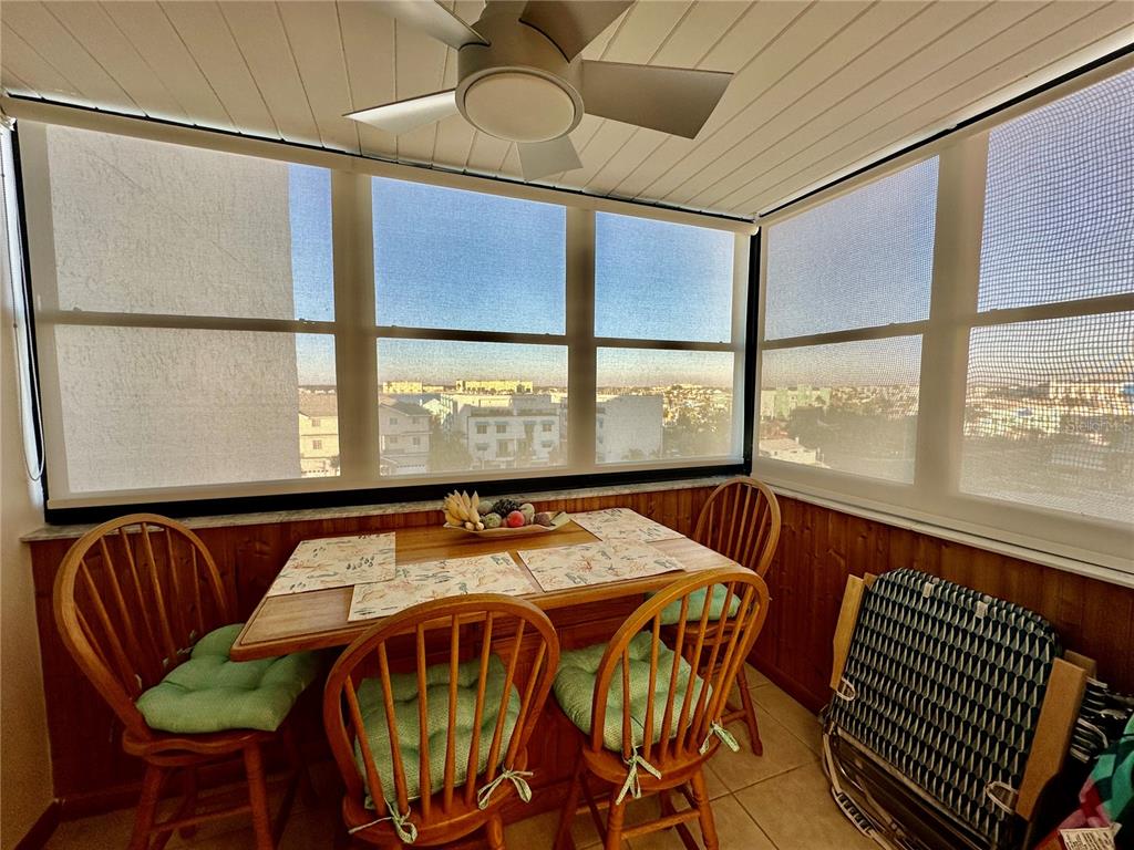 15462 Gulf Boulevard, Unit 501 Madeira Beach, FL 33708 - Photo 55 of 88 a view of a dining room with furniture window and outside view