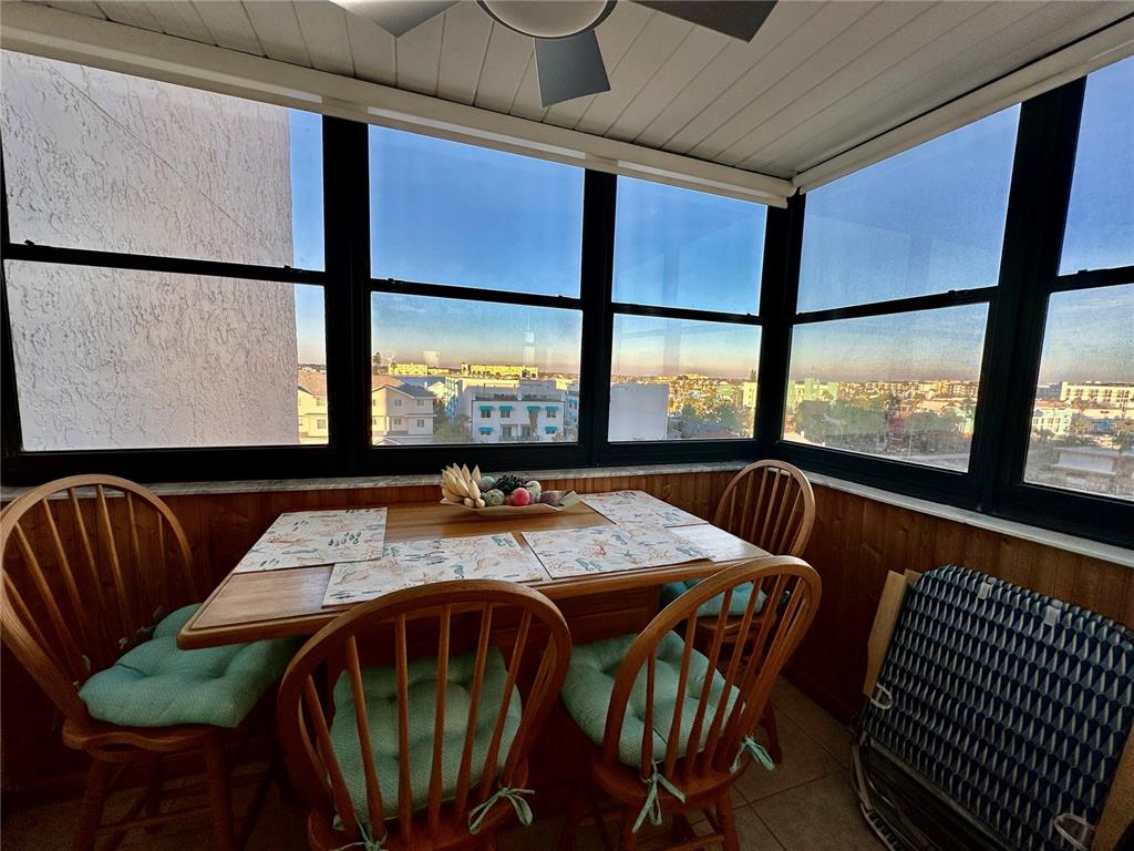 15462 Gulf Boulevard, Unit 501 Madeira Beach, FL 33708 - Photo 58 of 88 a view of a dining room with furniture window and outside view