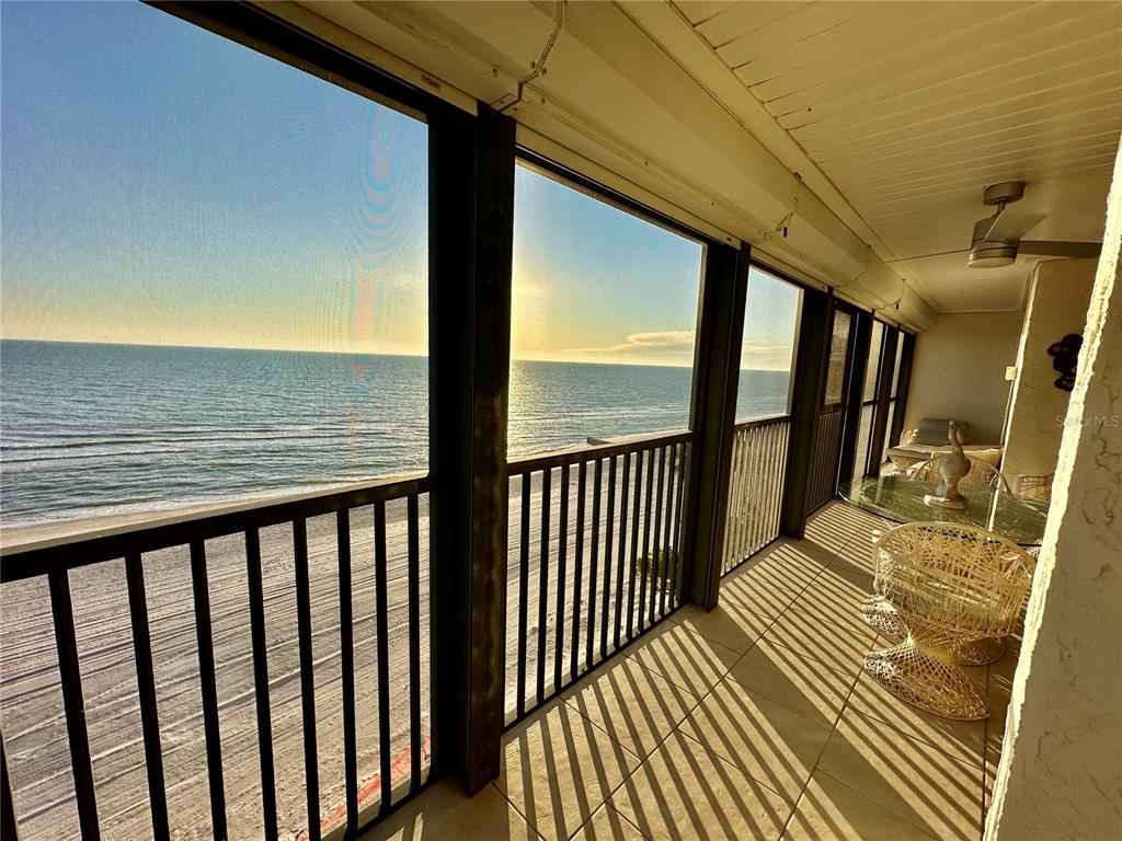 15462 Gulf Boulevard, Unit 501 Madeira Beach, FL 33708 - Photo 88 of 88 a view of a balcony with wooden floor