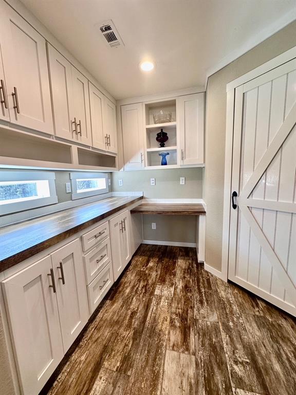 344 JP Cave Road Sherman, TX 75090 - Photo 10 of 21 a kitchen with granite countertop white cabinets and white appliances