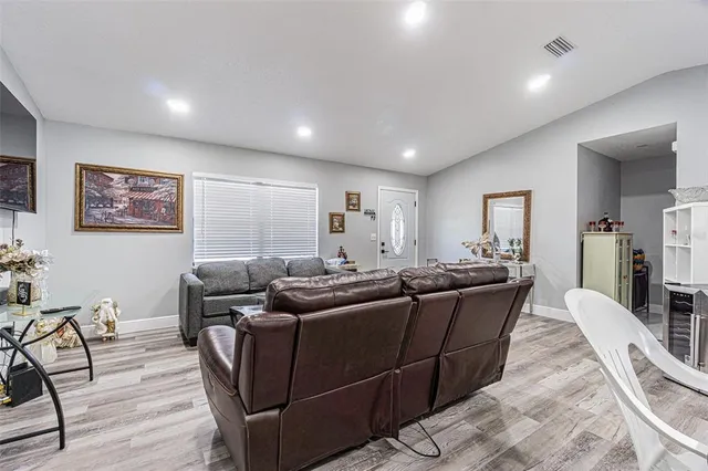 a view of bathroom with a toilet sink and a mirror