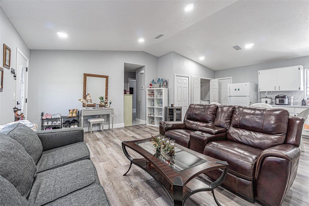3482 Dow Lane Spring Hill, FL 34609 - Photo 19 of 30 a living room with furniture and a wooden floor