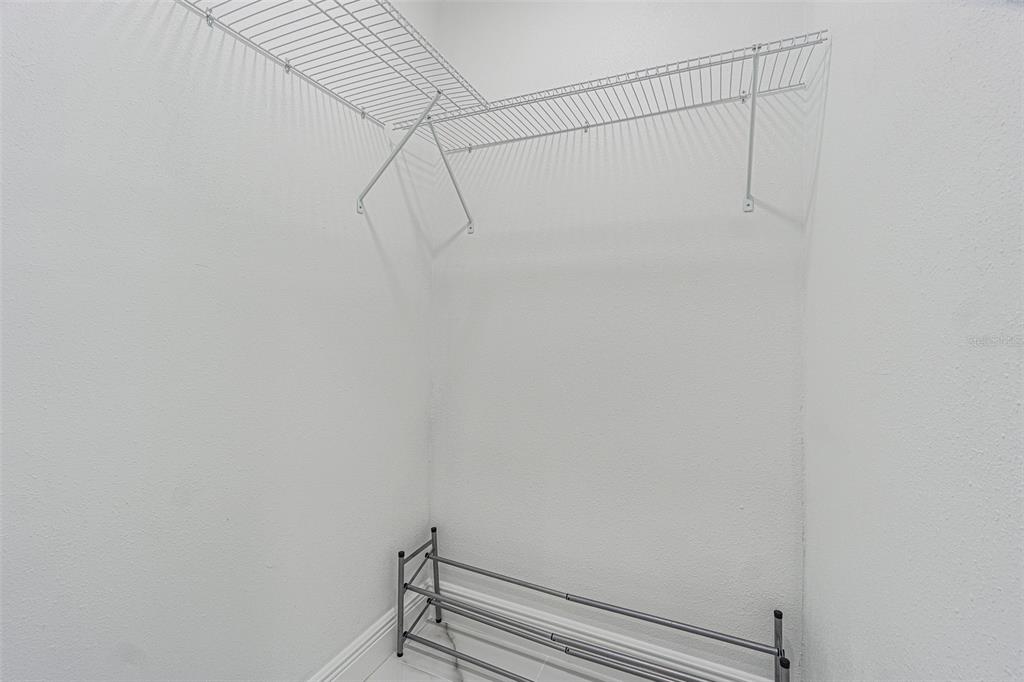 3482 Dow Lane Spring Hill, FL 34609 - Photo 26 of 30 a view of small space with racks on the wall