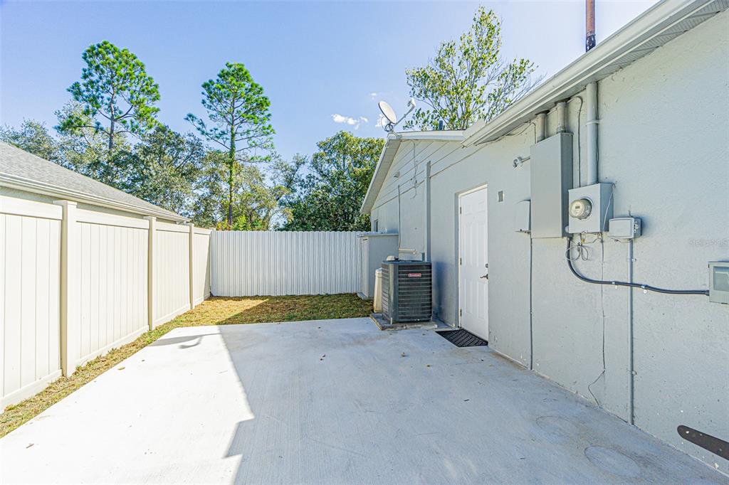 3482 Dow Lane Spring Hill, FL 34609 - Photo 27 of 30 a view of a backyard