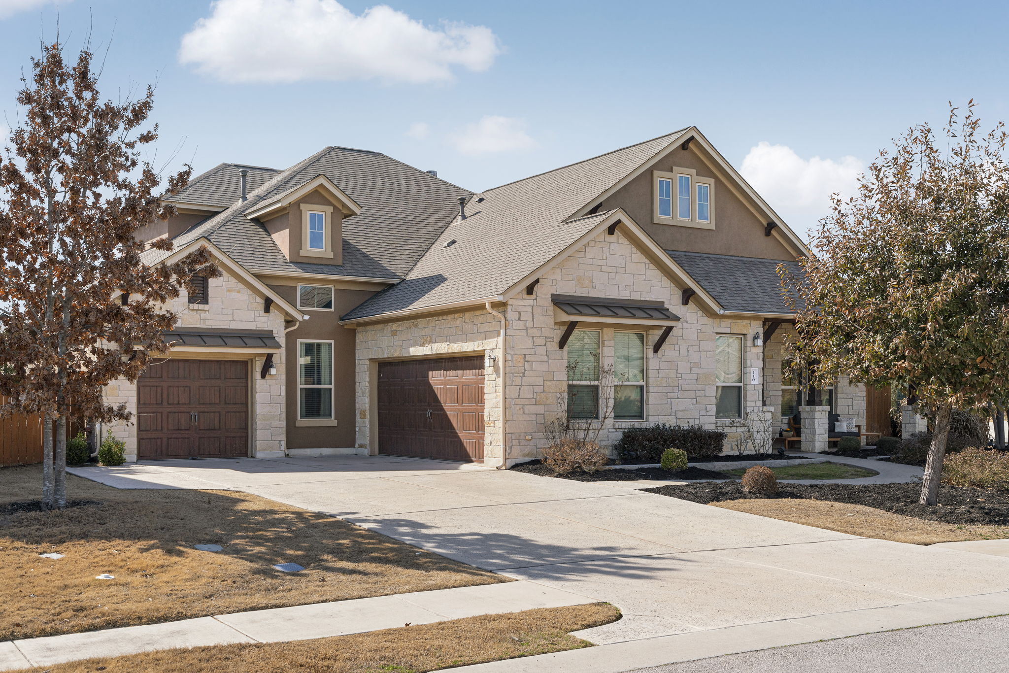 Custom-built former model home in Dripping Springs’ gated Arrowhead Ranch.
