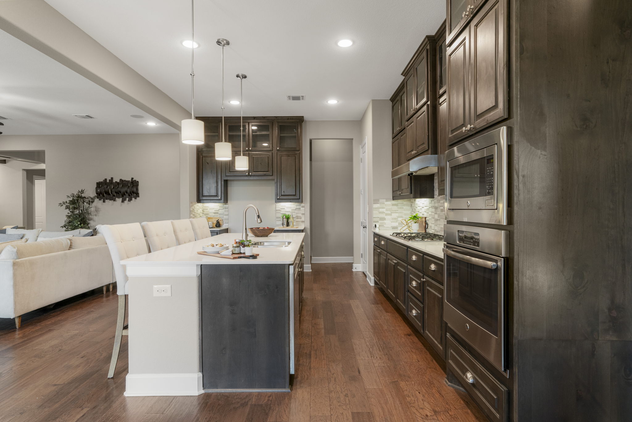 110 Topaz Circle Dripping Springs, TX 78620 - Photo 16 of 40 The spacious kitchen offers ample space for multiple chefs in the kitchen with counter space galore plus a convenient pantry.