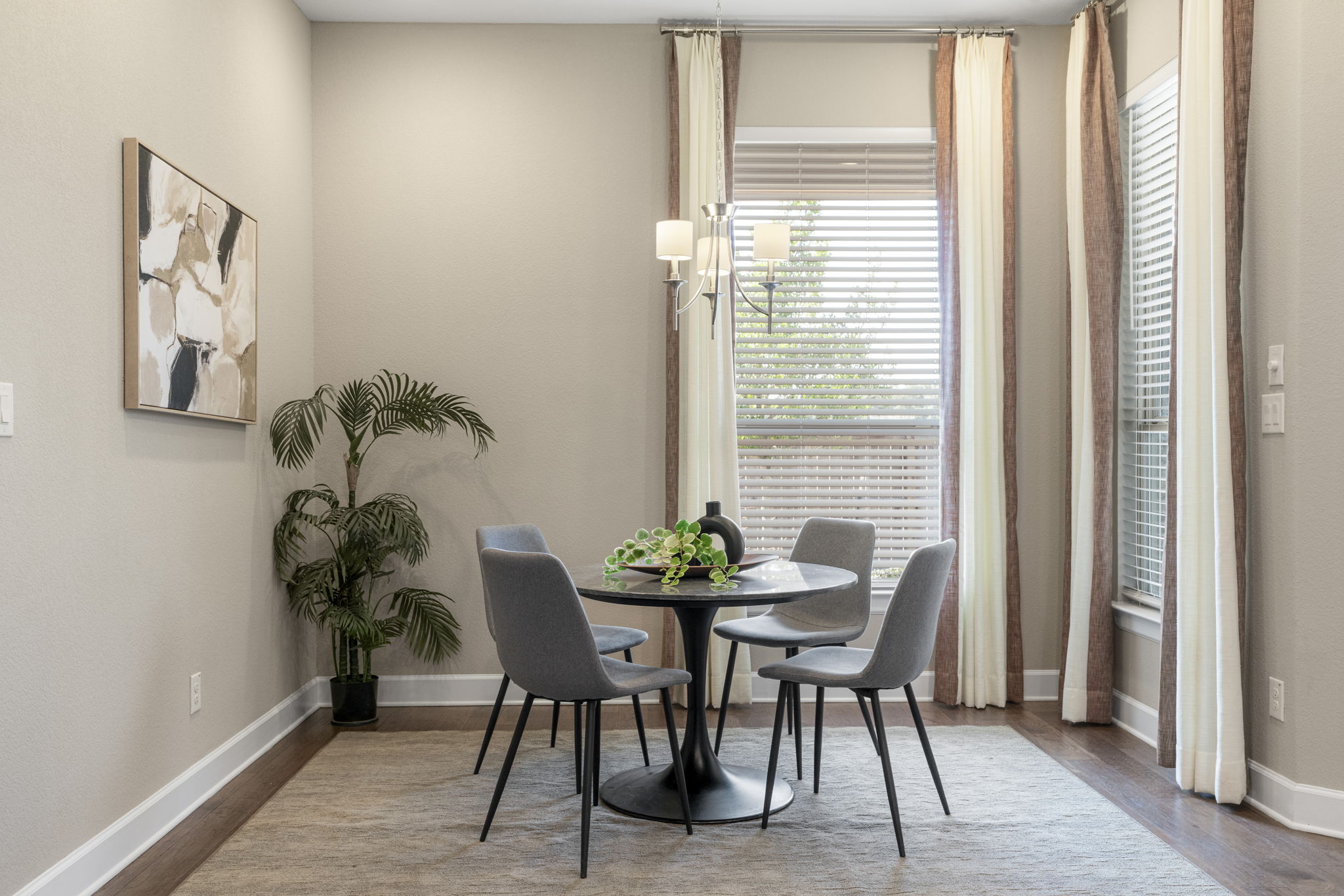 110 Topaz Circle Dripping Springs, TX 78620 - Photo 17 of 40 The sunny dining area off the kitchen is perfect for weeknight meals with peaceful backyard views.