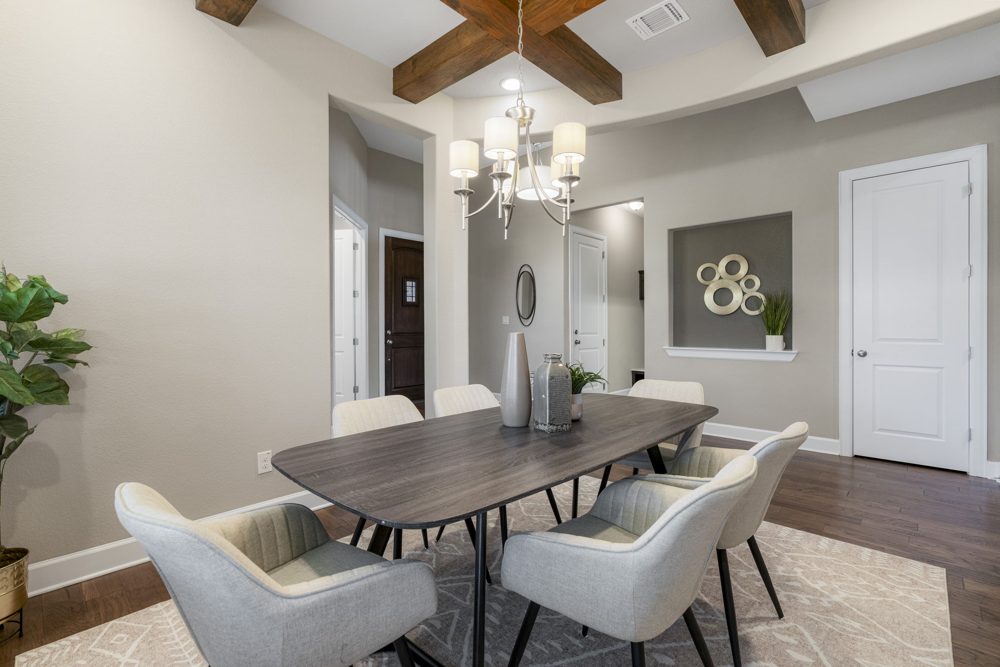 110 Topaz Circle Dripping Springs, TX 78620 - Photo 18 of 40 The elegant formal dining room stretches off the entry foyer before it opens into the mail living area.