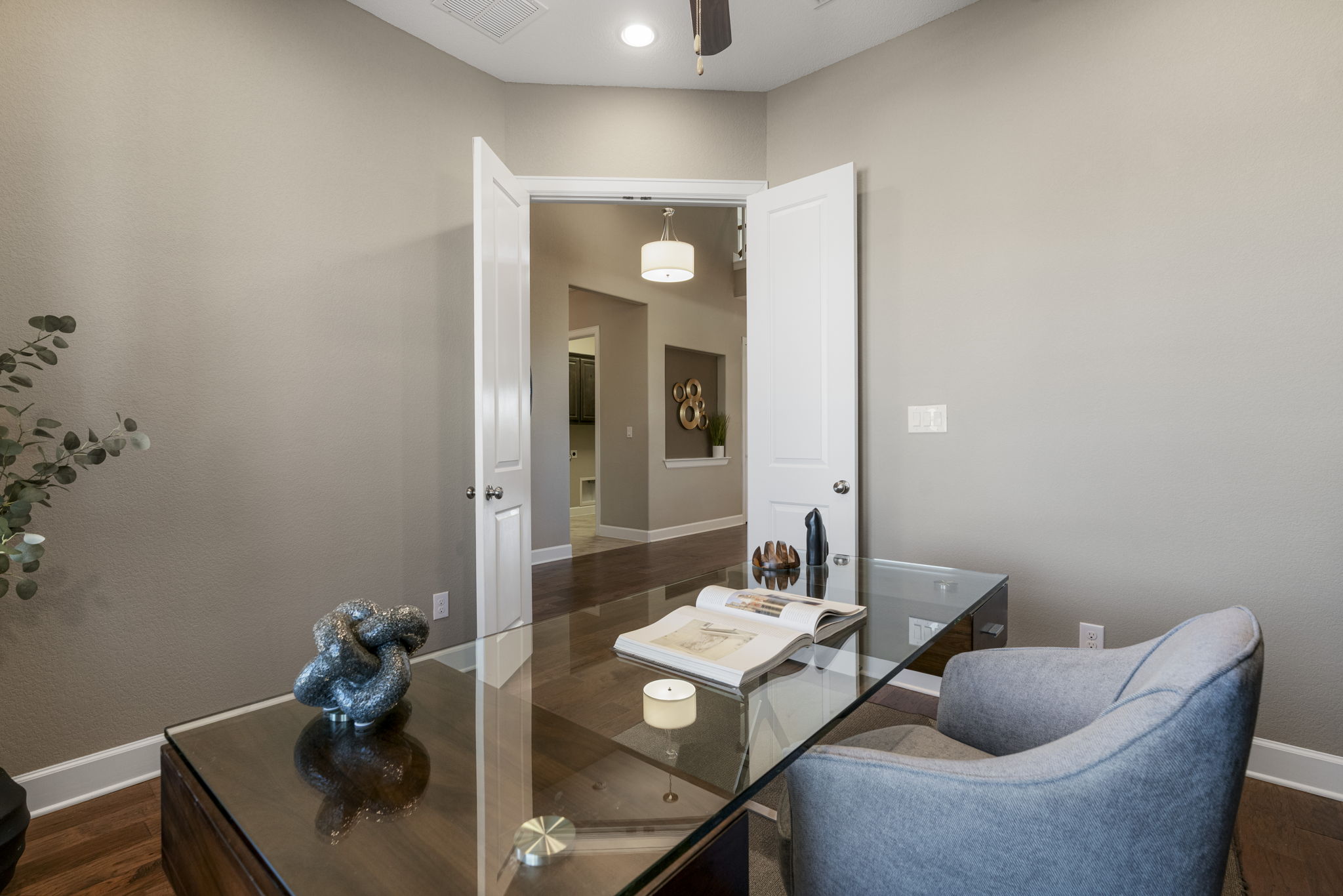 110 Topaz Circle Dripping Springs, TX 78620 - Photo 23 of 40 Double doors off the entry foyer open into a secluded home office perfect for the remote worker.