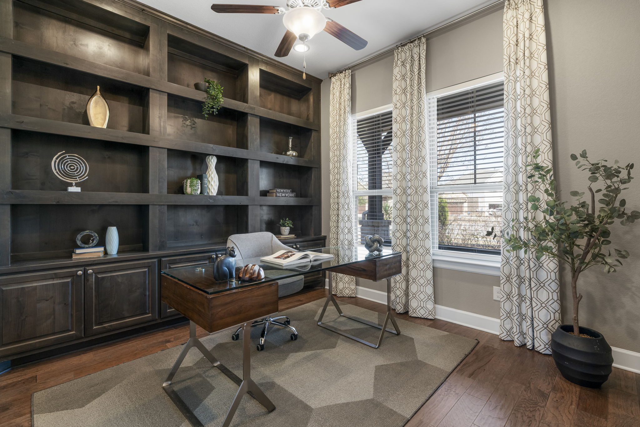 110 Topaz Circle Dripping Springs, TX 78620 - Photo 24 of 40 The home office is designed to impress with sophisticated built-ins.