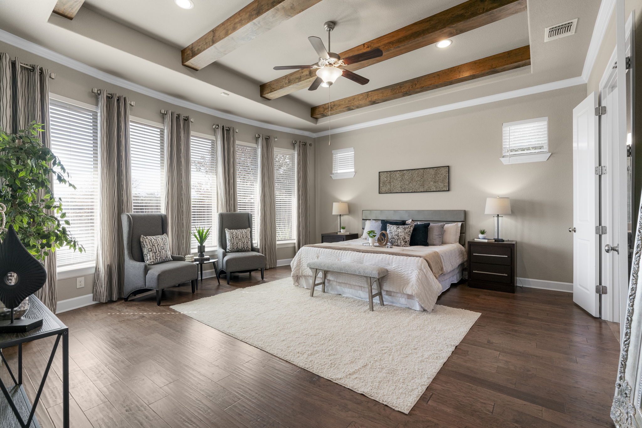 110 Topaz Circle Dripping Springs, TX 78620 - Photo 5 of 40 This home features 4 main floor bedrooms including this deluxe luxury primary suite, well secluded away for privacy.