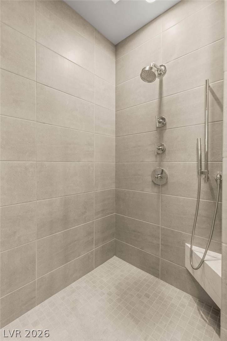 571 Overlook Rim Drive Henderson, NV 89012 - Photo 36 of 85 Full bathroom with a tile shower