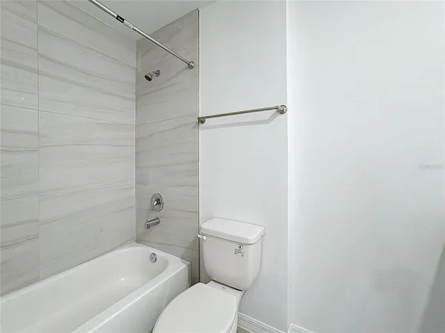 a bathroom with a toilet