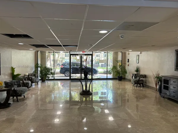 a kitchen with stainless steel appliances granite countertop a stove and a microwave