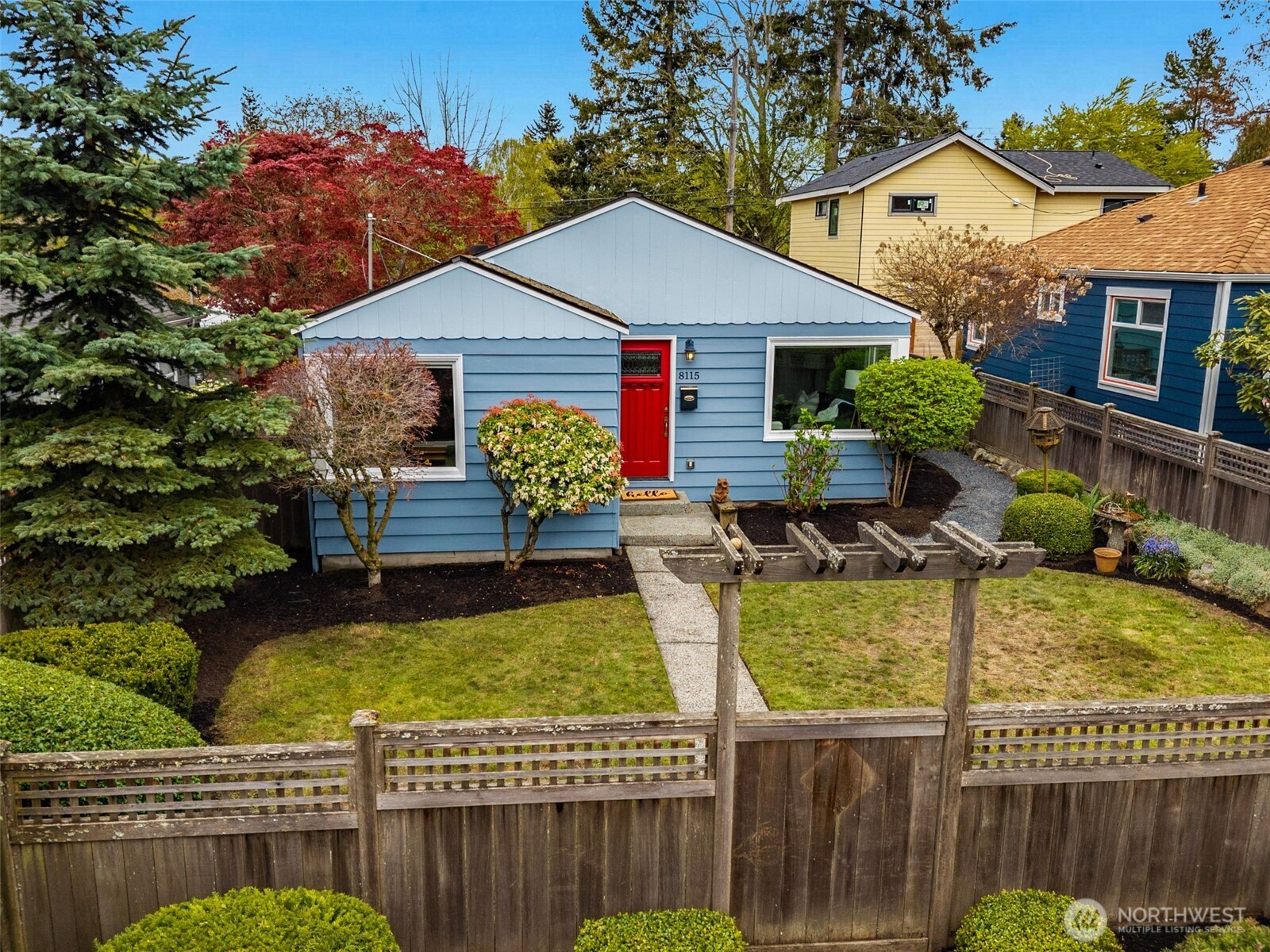 8115 34th Avenue Southwest Seattle, WA 98126 - Photo 25 of 39 a front view of house with swimming pool yard fire pit and outdoor seating