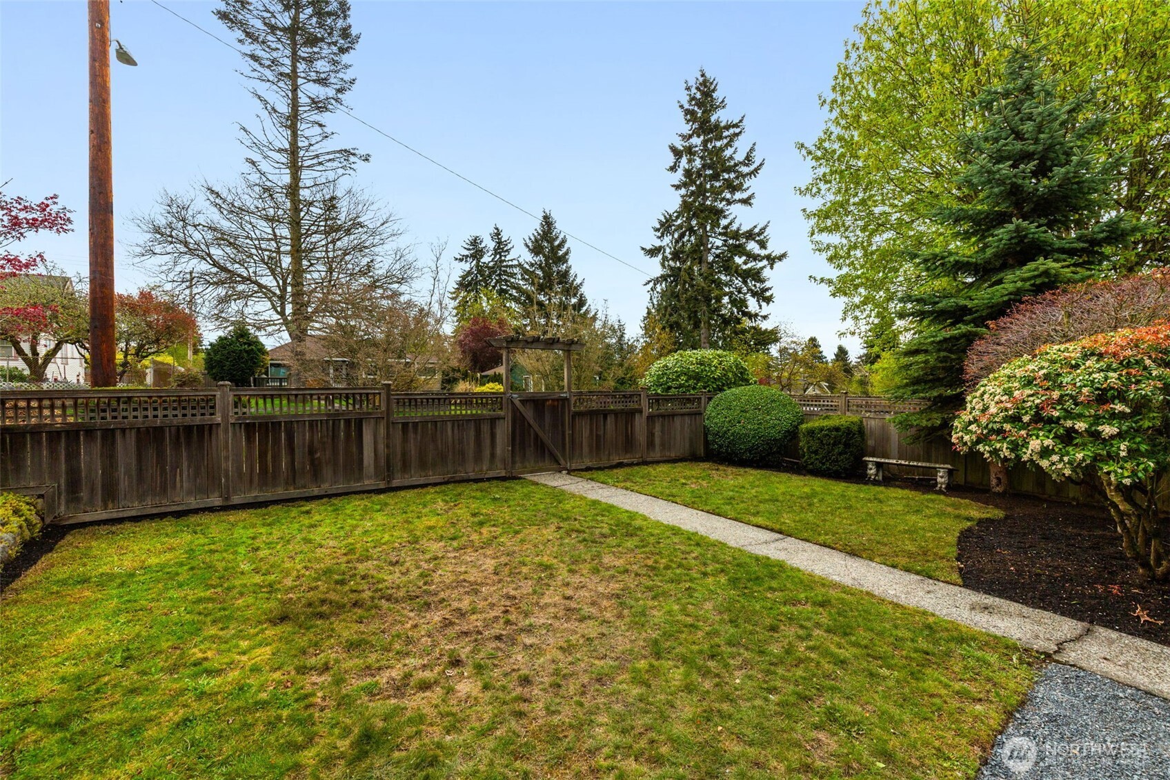 8115 34th Avenue Southwest Seattle, WA 98126 - Photo 26 of 39 a view of a backyard with a garden