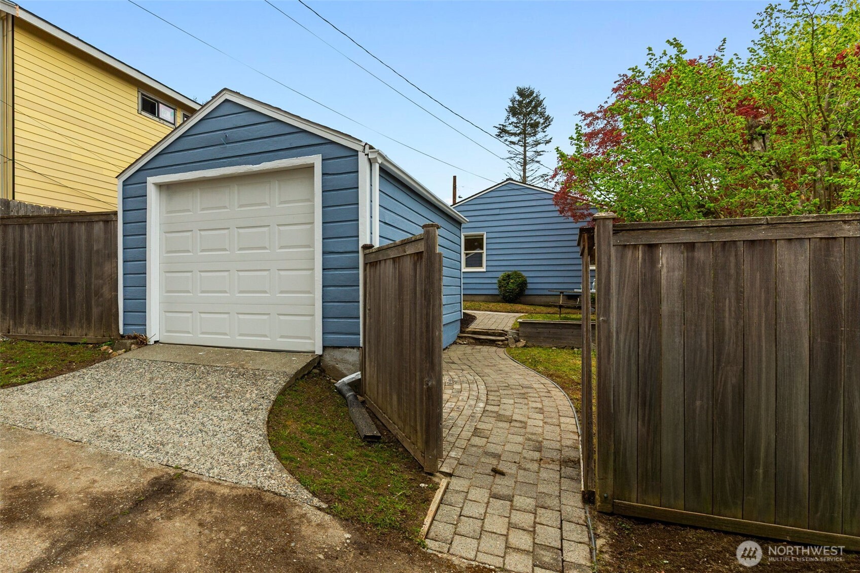 8115 34th Avenue Southwest Seattle, WA 98126 - Photo 30 of 39 a house view with a backyard space