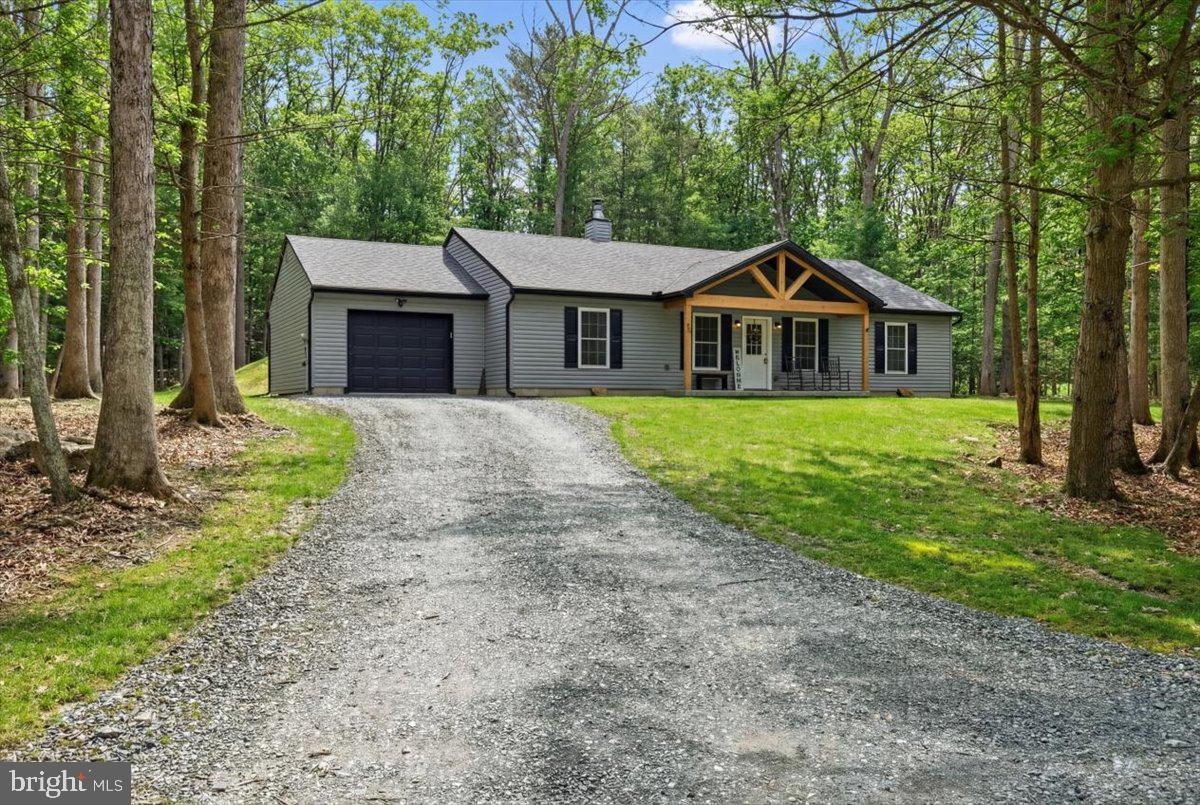 85 McCool Lane Lehighton, PA 18235 - Photo 1 of 39 a front view of a house with a garden