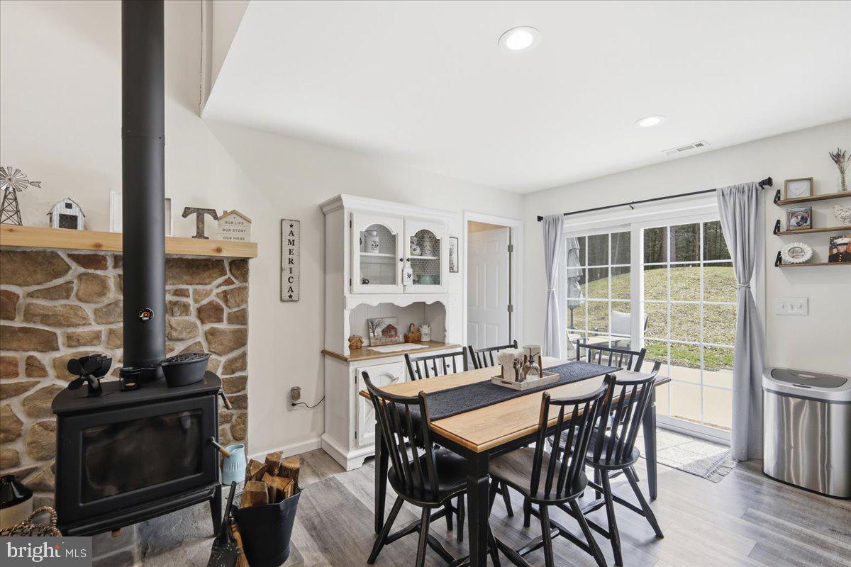 85 McCool Lane Lehighton, PA 18235 - Photo 12 of 39 a view of a dining room with furniture and wooden floor