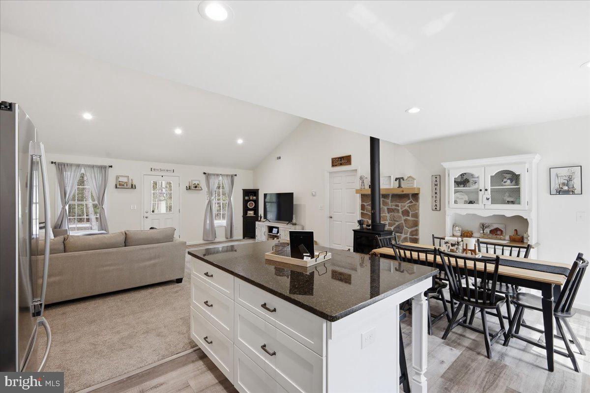 85 McCool Lane Lehighton, PA 18235 - Photo 16 of 39 a kitchen with granite countertop a table and chairs