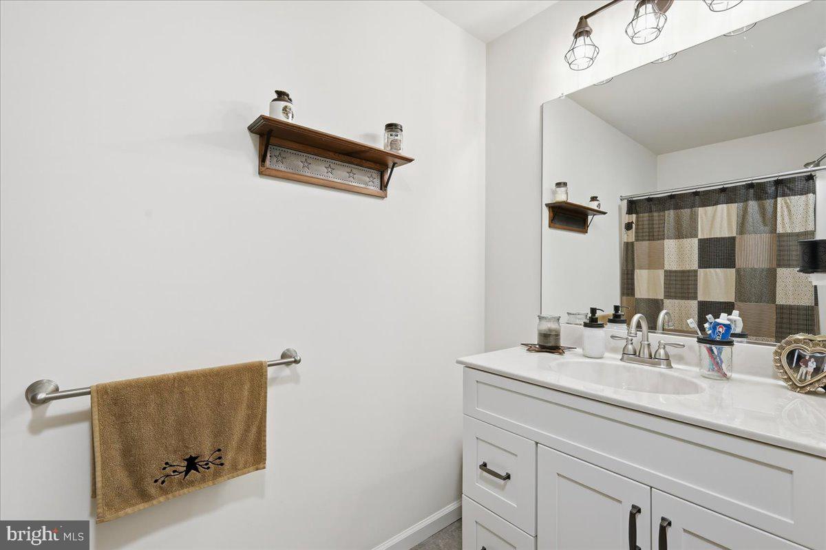 85 McCool Lane Lehighton, PA 18235 - Photo 23 of 39 a bathroom with a sink and a mirror