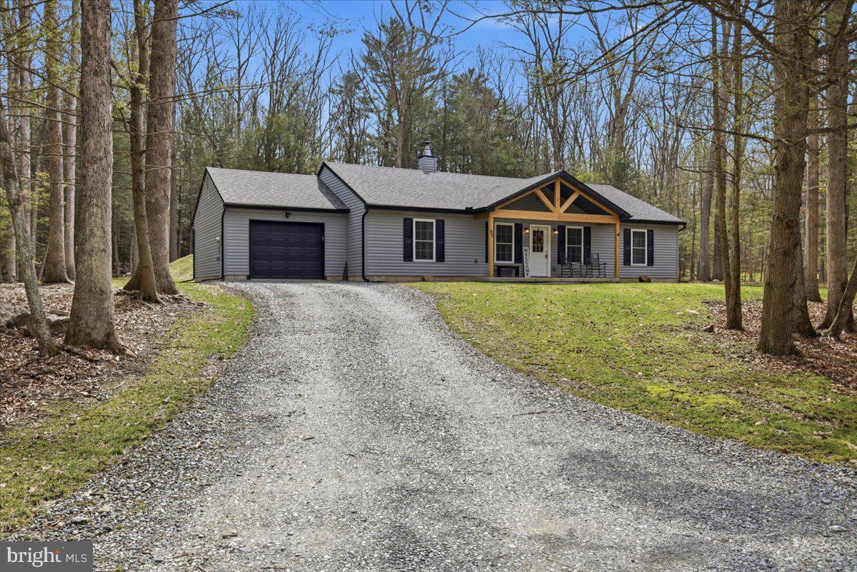 85 McCool Lane Lehighton, PA 18235 - Photo 3 of 39 a view of a house with a yard and large tree