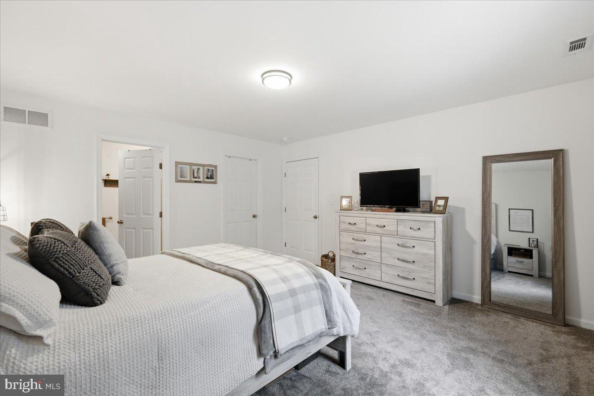 85 McCool Lane Lehighton, PA 18235 - Photo 32 of 39 a bedroom with a bed and flat screen tv