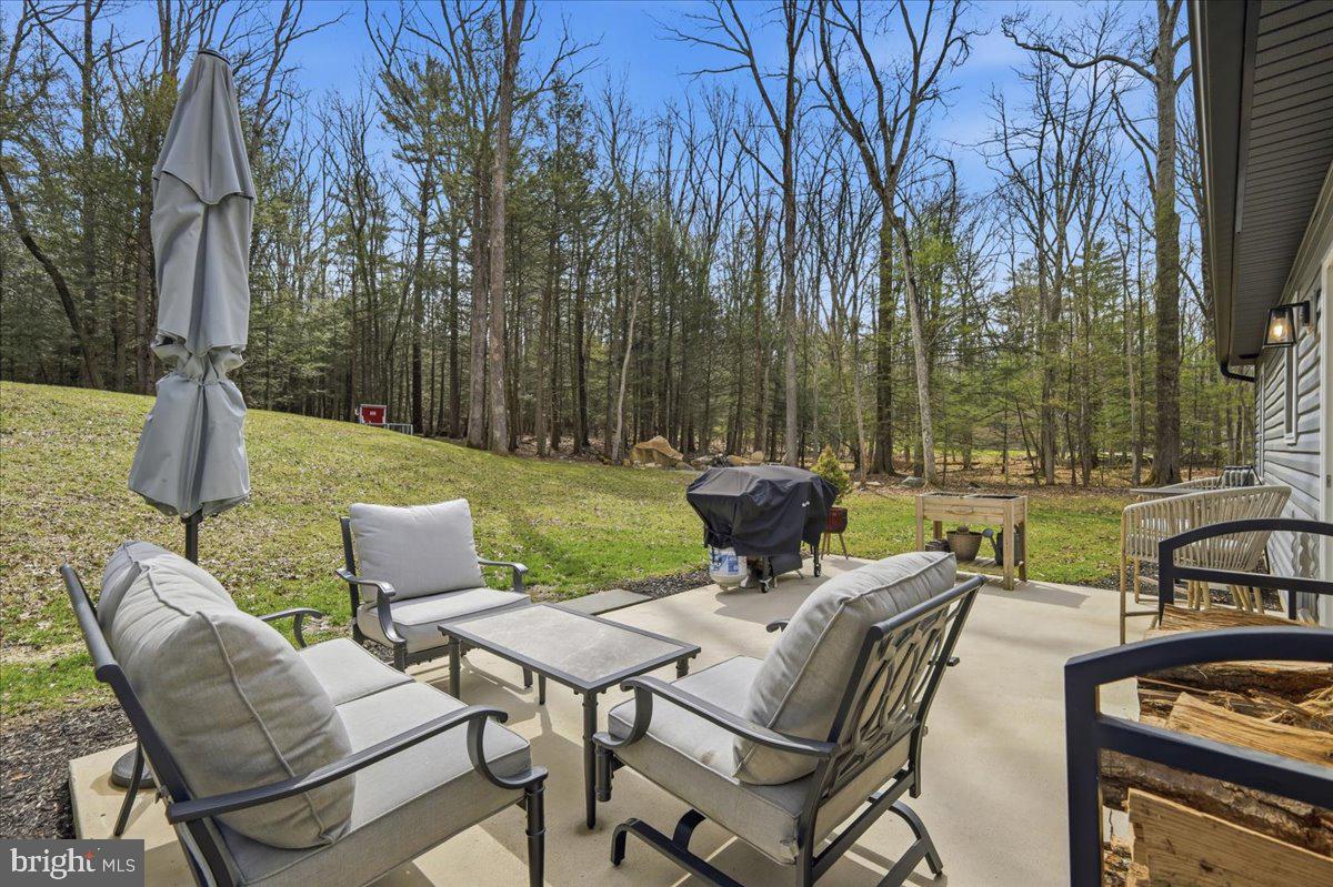 85 McCool Lane Lehighton, PA 18235 - Photo 39 of 39 a view of an outdoor sitting area with furniture and garden