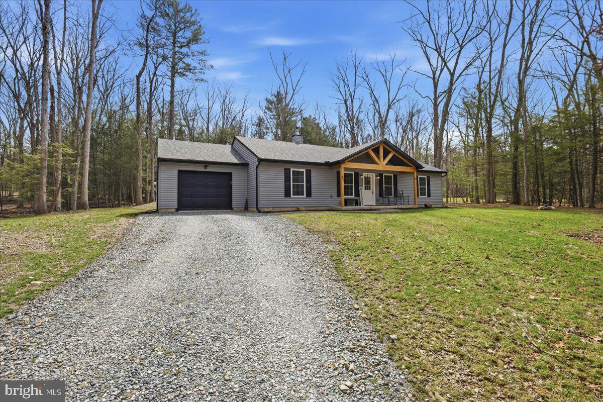 85 McCool Lane Lehighton, PA 18235 - Photo 4 of 39 a front view of a house with yard and green space