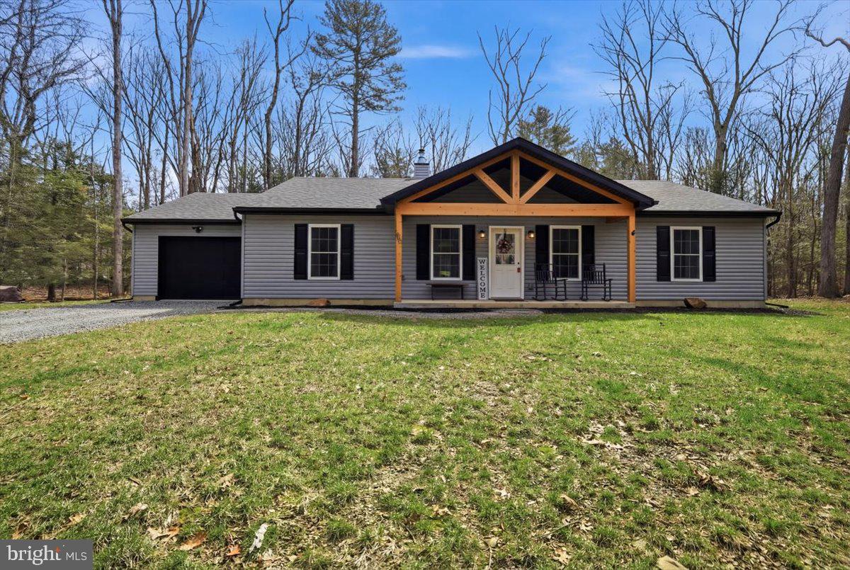 85 McCool Lane Lehighton, PA 18235 - Photo 5 of 39 a front view of a house with yard and trees