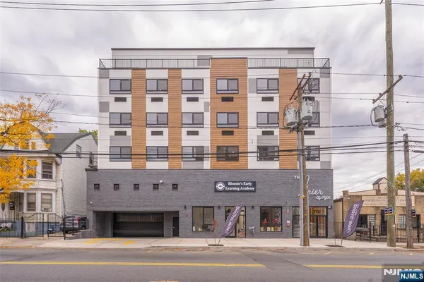 a view of a building and a street