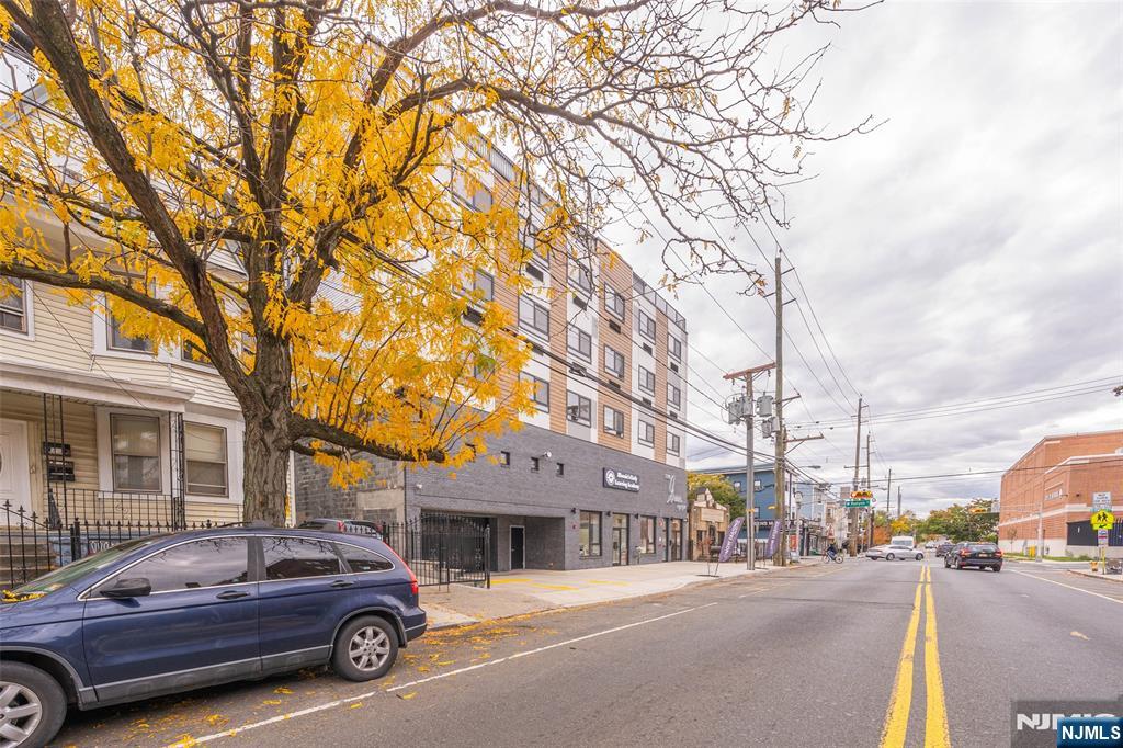 768 Bergen Street, Unit 5D Newark, NJ 07108 - Photo 13 of 14 a car parked in front of a building