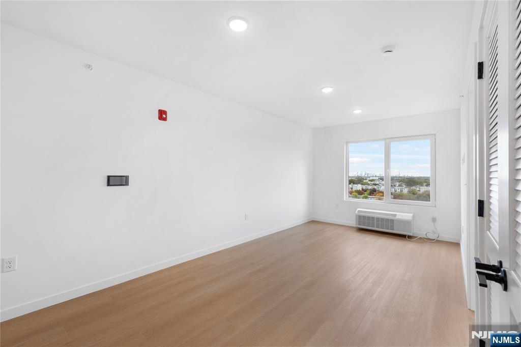 768 Bergen Street, Unit 5D Newark, NJ 07108 - Photo 4 of 14 a view of an empty room with a window
