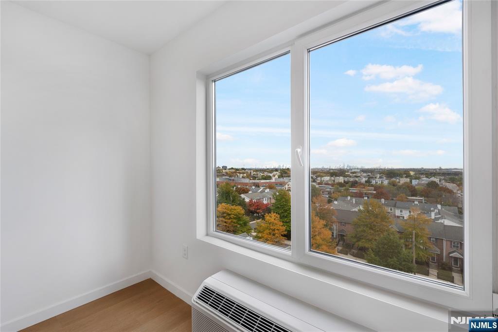 768 Bergen Street, Unit 5D Newark, NJ 07108 - Photo 7 of 14 a view of a room with a large window with outer view