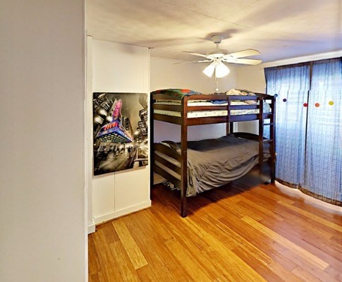 372 Pua Road Kapaa, HI 96746 - Photo 14 of 20 a bedroom with furniture and a closet