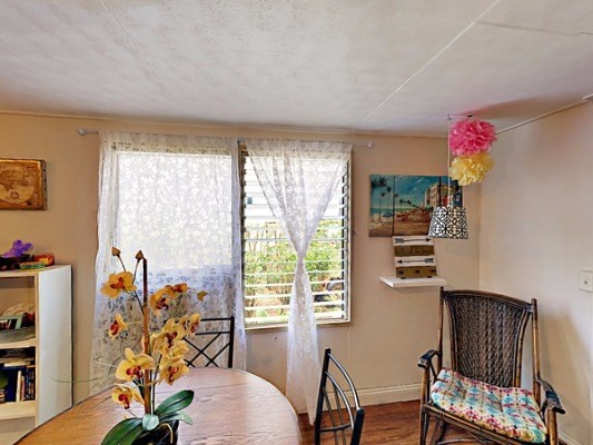 372 Pua Road Kapaa, HI 96746 - Photo 7 of 20 a view of a livingroom with furniture and a potted plant